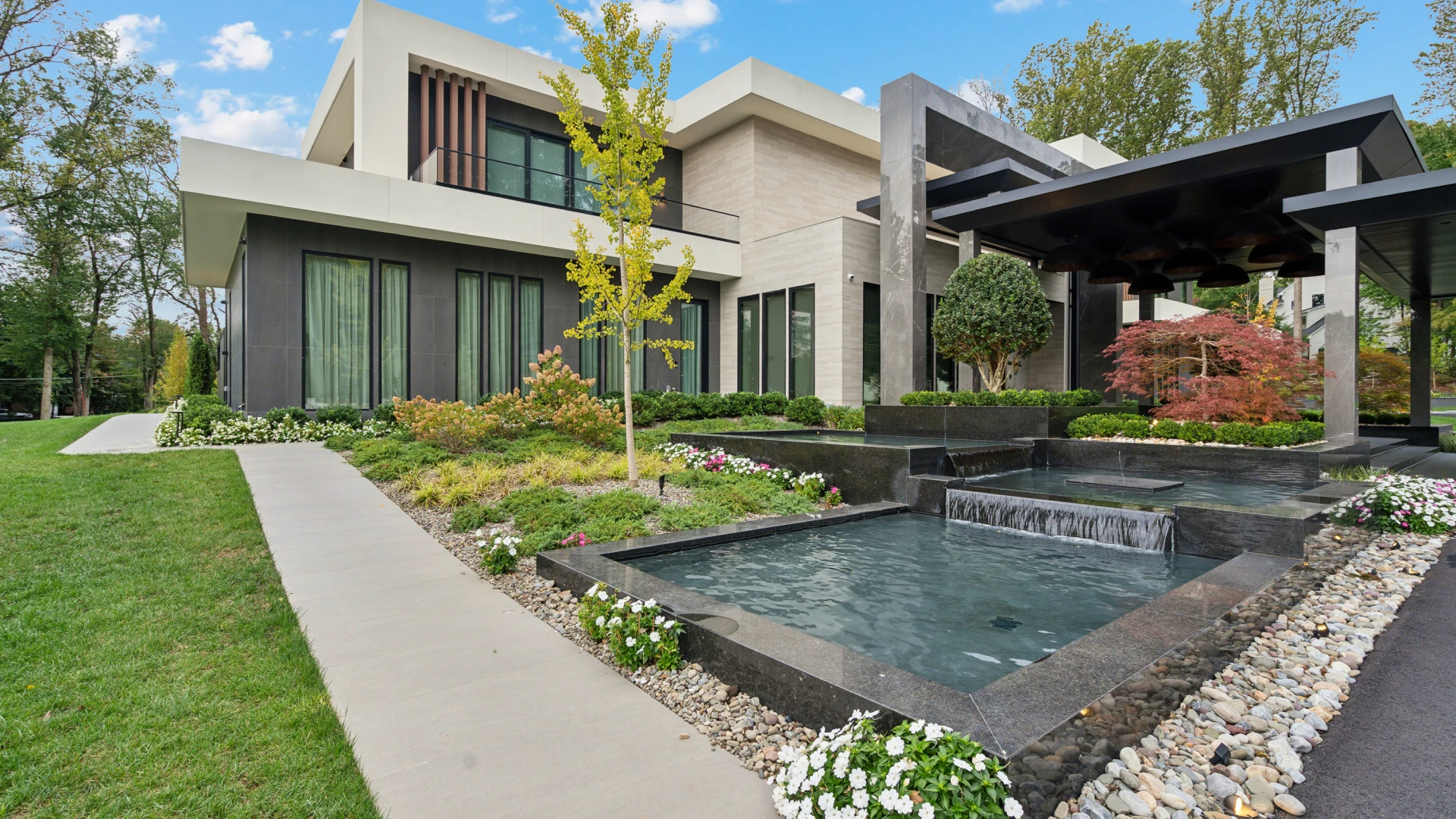Plantings, lighting, and hardscapes to highlight and accentuate the latest in modern luxury architecture.